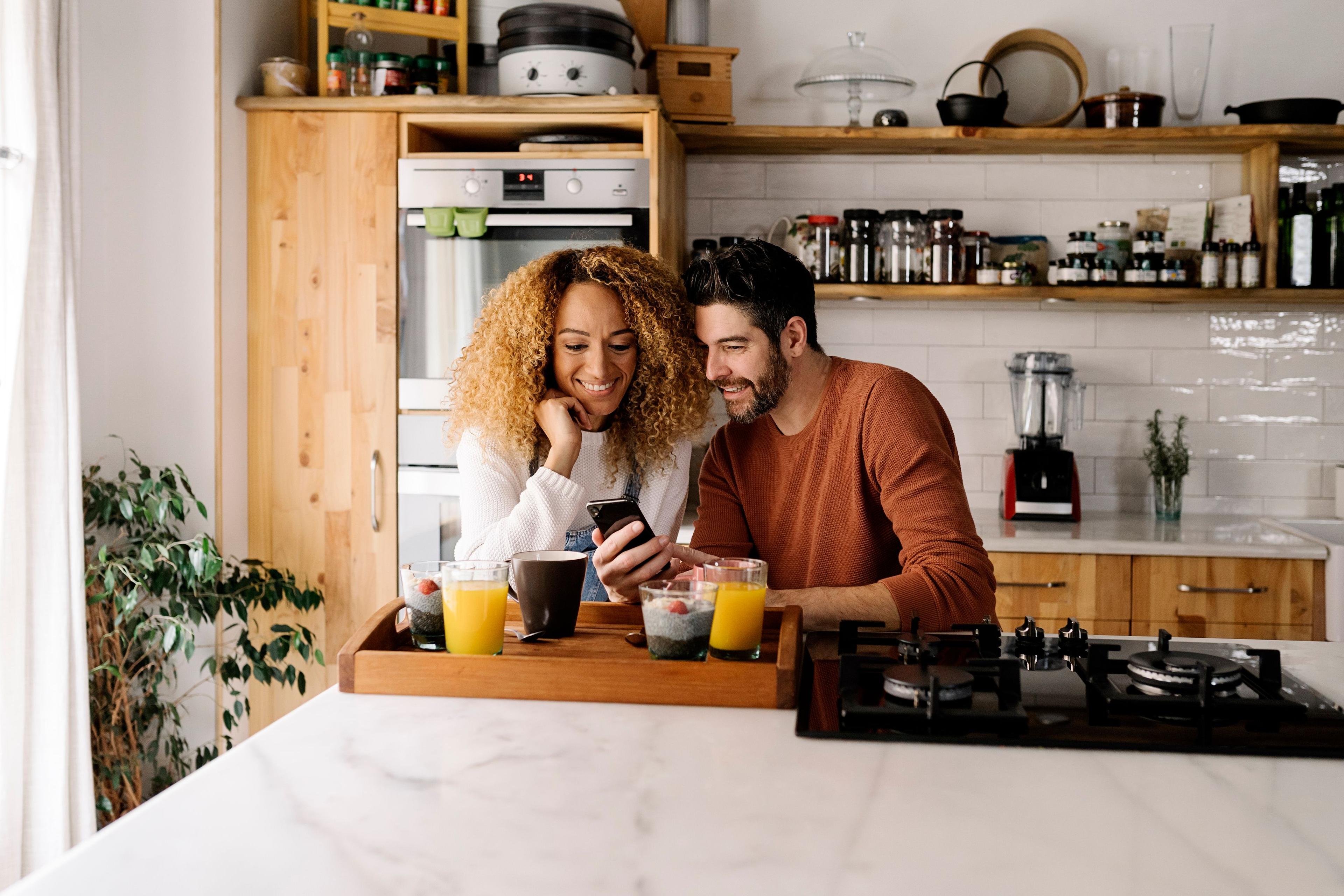 Couple enjoying comfort in kitchen - Heative